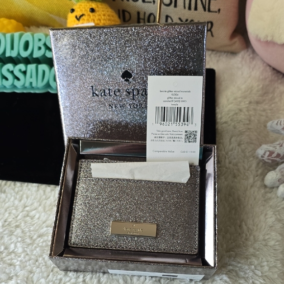 kate spade Handbags - Kate Spade NWT NEW IN  BOX silver glitter card holder with Silver logo plaque